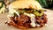 Steamig hot pulled pork sandwich with cheese and pickles