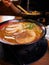 Steaming bowl of miso chashu ramen, vertical, Osaka, Japan