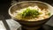 Steaming Bowl of Traditional Asian Noodle Soup on Table