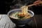 Steaming bowl of udon, Japanese comfort captured in photograph