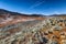 Steaming cone in Hverir geothermal area with boiling mudpools and steaming fumaroles in Iceland