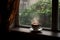 Steaming cup of coffee on window sill. Generative AI