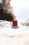 Steaming cup of hot coffee,tea or chocolatemilk in the cold fresh white snow, Winter,cozy,drink,snowy day concept background in