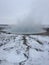 Steaming geothermal geyser in Iceland