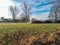 Steaming pile of manure on farm field in the winter