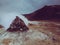 Steaming sulphur fumaroles at geothermal area Hverir in north Iceland