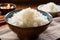 Steaming white rice in a bowl, a simple and satisfying meal