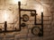 Steampunk decor. With iron pipes. and incandescent lamps. Loft style wall and steampunk pipes