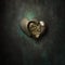 Steampunk heart locket on grunge background