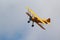 Stearman Biplane Flying through the Sky