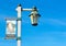 Stearn`s Wharf welcome banner with carriage lamp on metal pole