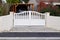 Steel aluminium white metal gate fence on modern suburb house street