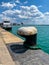 Steel anchoring bollard on the sea dock.