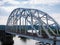 Steel arch truss of the railroad bridge across the river