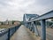 Steel arch truss of the road bridge across the river