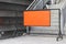 Steel barrier with orange label placed across the stairs.