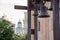 Steel bells in the foreground with the church with a green dome and rowanberry or wild ash with red fruits in the background. Even