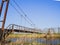 Steel bridge and gas pipeline through irrigation canal