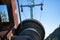 Steel cable and winch. Part of an old winch with a steel rope on a lift. Detail of the cableway. Close-up view of steel big wheel