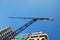 Steel crane at building site