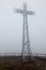 Steel cross in the mist (Tarnica, Bieszczady, Poland)