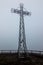 Steel cross in the mist (Tarnica, Bieszczady, Poland)