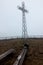 Steel cross in the mist (Tarnica, Bieszczady, Poland)