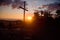 Steel cross on the top of the mountain Vtacnik during sunrise, Slovakia