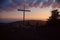 Steel cross on the top of the mountain Vtacnik during sunrise, Slovakia