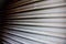 steel garage door loading dock shipping receiving delivery empty truck trailer