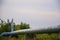 Steel gas pipe running through green fields