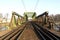 Steel green railway bridge in Opole