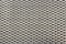 Steel mesh. Grid of car air filter. Metal grill texture of vehicle air filter.