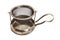 Steel old vintage tea strainer with metal saucer and handle on isolated background.