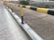 Steel pipe Guard rail painted with Yellow and Black enamel paint and acts as barrier or boundary lines of an asset owned