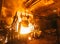Steel production in electric furnaces, melting of metal in a steel plant. High temperature in the melting furnace