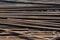 Steel reinforcement bars. Construction rebar steel work reinforcement. Industrial background. Stack of iron bars