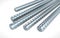 Steel reinforcement rebars on white background, construction ind