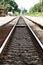 Steel and rock Railroad track points, rusty train track perspective backgrounds, home decoration design wallpaper, symmetry