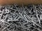 Steel screw construction metal industrial tool macro. Metallic closeup hardware iron equipment repair object self-tapping