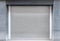 Steel shutter door of warehouse, storage or storefront for background and textured
