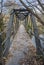 Steel span footbridge crossing a river