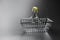 steel supermarket basket on black background close-up