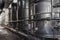 Steel tanks for wine fermentation at a modern winery. Large brewery silos for barley or beer