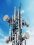 Steel telecommunications tower with satellite dishes. 3D illustration