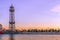 Steel truss tower Torre Jaume I in the port of Barcelona at sunset, Spain