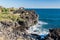 Steep black cliff in Catania, formed by ancient lava flows from volcano Etna