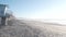 Steep cliff, rock or bluff, California coast. People walking, Torrey Pines beach