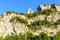 The steep cliffs around the Pont dArc in the Gorges de lArdeche in Europe, France, Ardeche, in summer, on a sunny day
