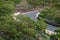 Steep curved mountain road in the middle of the bush